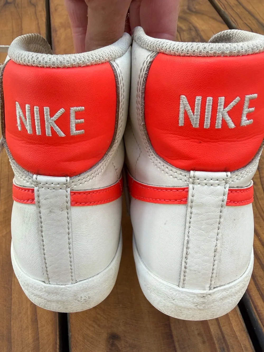 Nike High-Top Sneakers in Cream with Neon Orange Swoosh